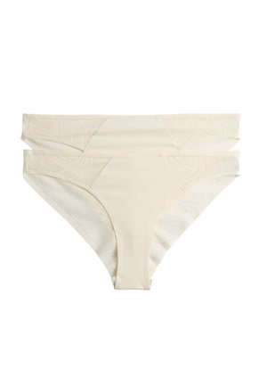 Beige bikinistil dameundertøj med mesh-sidestykker og en glat, sømløs front, vist lagt fladt på en hvid baggrund.