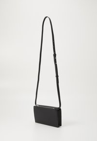 DKNY Etta Wallet On A String - Borsa Portafoglio Donna In Poliuretano Giallo Acido - Tracolla Regolabile