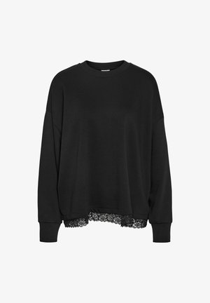 Svart sweatshirt i mjukt tyg, med rundad halsringning, sänkta axlar och spetsdetaljer vid fållen för extra finess.