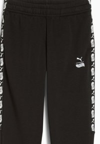 Schwarze Jogginghosen mit weißen Puma- und Hot Wheels-Logos an den Seitenstreifen und kleinen Logos near der rechten Tasche, ausgestattet mit einem elastischen Bund.