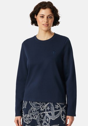 Marinblå sweatshirt med långa ärmar och rund halsringning. Har diskret logotypbroderi på bröstet. Slät, mjuk tygkvalitet.