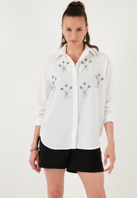 Bluza z gumbi - ecru