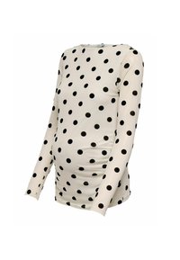 Bílý těhotenský top s dlouhým rukávem, černými puntíky a nařasenými boky pro přiléhavý vzhled.