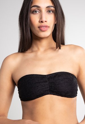 Svart stroppeløst bandeau-top laget av blonder med et strukturelt blomsterdesign, som har en sømløs utforming og buet utringning.