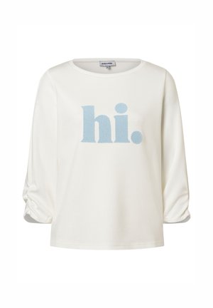 White long-sleeve shirt with ruched sleeves and light blue textured "hi." text centered on the front.