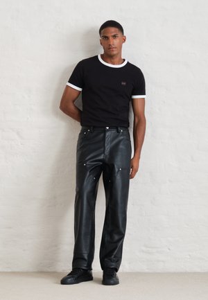 Calvin Klein Jeans, EXCLUSIVE REGULAR STRAIGHT LEG TROUSERS FAUX LEATHER CARPENTER  - Панталони - black
