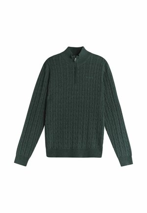 Mørkegrøn strikket sweater med halv-zip krave, der har et struktureret kabelmønster samt ribbet manchetter og kant.