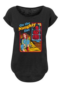 Black t-shirt featuring a colorful graphic design. Text reads "On the Naughty list." Image depicts a figure in a room with a window and a shadowy figure.