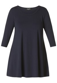 Marineblauwe, langemouwen tuniek met een ronde hals. Gemaakt van een zachte, gladde stof met een uitlopende silhoutte en een knielange zoom.