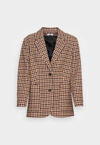 Blazer à carreaux marron et beige avec une fermeture à un bouton, des revers crantés et une doublure intérieure noire. Comprend deux poches avant.