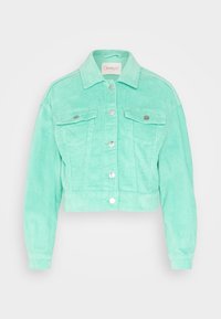 Jasno miętowozielona krótka kurtka z korduroju z długimi rękawami, dwiema kieszeniami na piersi, srebrnymi guzikami i kołnierzykiem. Miękka faktura, casualowy design.