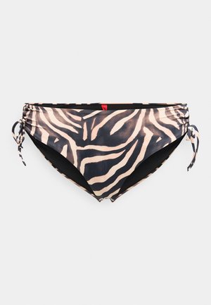 Slip de costum de baie pentru femei cu imprimeu de zebra negru și bej și șnururi laterale reglabile pe fundal alb.