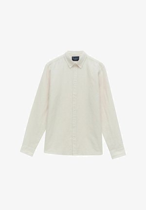 Chemise à manches longues, de couleur crème clair, avec un col classique. Fabrication en tissu doux, dotée d'une texture unie et d'un ourlet droit.