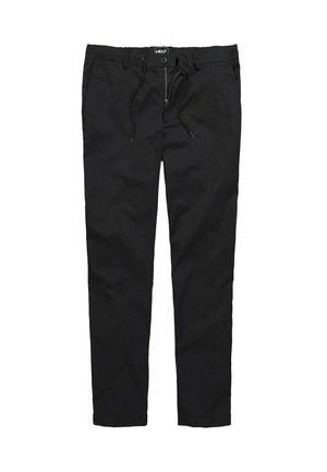 Pantalones de mezcla de algodón negros con cierre de cordón y botón, que presentan un corte ajustado y un sutil brillo. Incluyen dos bolsillos laterales.