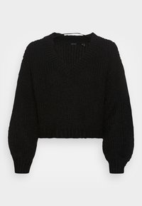 Černý krátký svetr s výstřihem do V, žebrovanou texturou a balónovými rukávy. Vyrobený z husté pleteniny. Elastický lem.