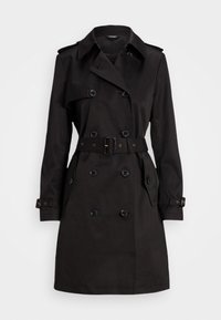 Svart trenchcoat med dubbelknäppning, bälte i midjan, axelkläppar och sidofickor. Tillverkad av ett slätt, hållbart tyg.