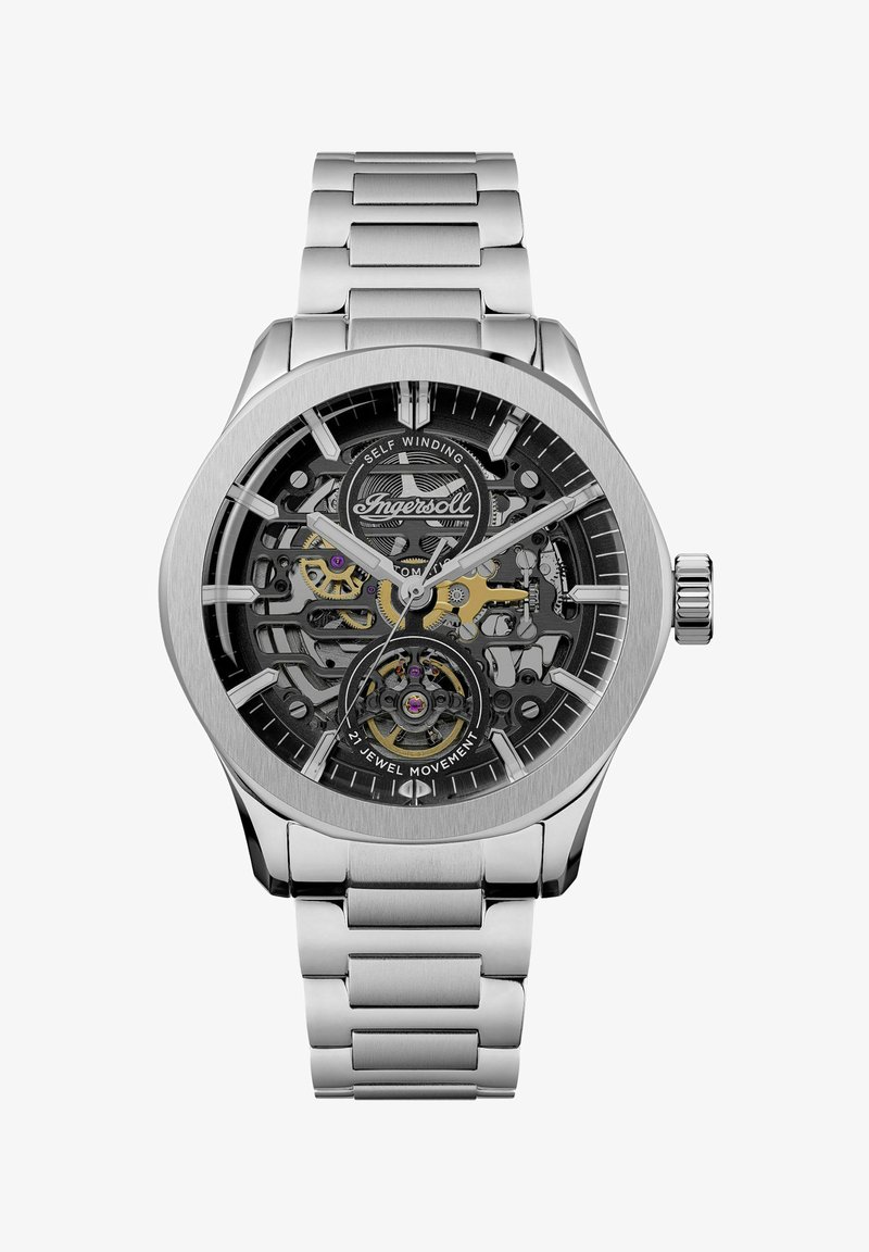 Roestvrijstalen horloge met een skeleton wijzerplaat die gouden en zwarte tandwielen toont, een automatisch opspoelsysteem en een braceletband.
