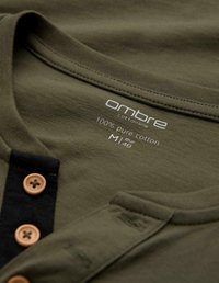 Olivgrön bomulls skjorta med svart knapplist och beiga knappar, märkt Ombre bomullslinjen, 100% ren bomull, storlek M/48 EUR.