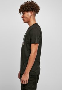 Merchcode MIAMI VICE RETRO - T-shirts med print - black