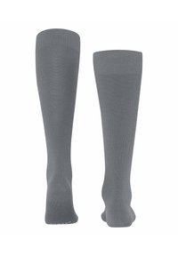 Graue knielange Socken mit einem gerippten oberen Rand, aus einem glatten Stoff gefertigt, mit einem nahtlosen Zehenbereich und einer engen Passform.