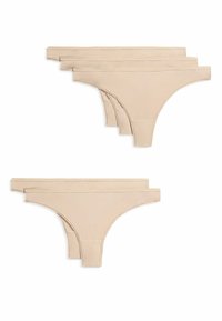 Nude stringondergoed set, met zacht elastisch materiaal, minimalistisch ontwerp en vier identieke paren met gladde naden.