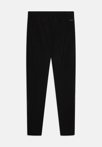 Svarta sportbyxor i lätt tyg, med en bekväm elastisk midja och tapered design med diskreta sömdetaljer.