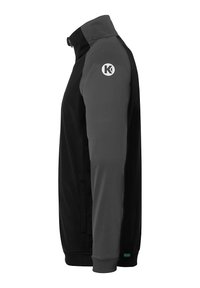 Black jacket with a gray zippered upper portion. Features a stand-up collar, side pockets, and a circular logo on the left shoulder.