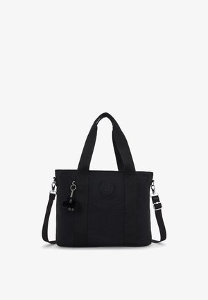 Borsa tote nera con doppie maniglie, tracolla regolabile, toppa rotonda con logo e piccolo portachiavi peluche attaccato a una delle maniglie.