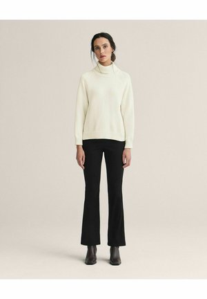 Stickad tröja - offwhite