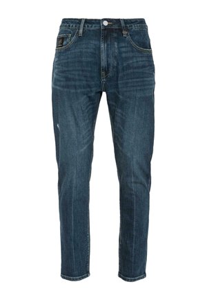 Tmavomodré úzke džínsy s vyblednutými detailmi, päť vreciek, pútka na opasok a zapínanie na gombík v páse.