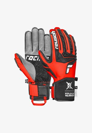 Gants de gardien rouges et gris avec une prise texturée, des doigts renforcés et une sangle de poignet réglable. Présente la marque "WORLD CUP WARRIOR".