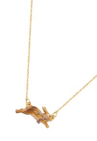 Gold chain necklace featuring a brown and beige rabbit pendant with a detailed scarf, smooth textures, and a playful jumping design.