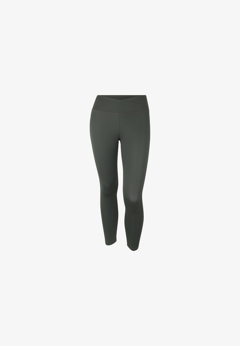Leggings de un verde oscuro, de cintura alta, con una textura suave y un diseño de cinturilla cruzada. Presentan una silueta ajustada y estilizada.