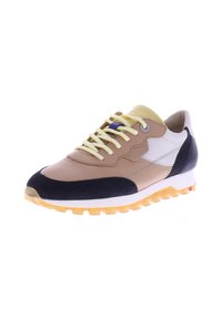 Sneaker with a mix of tan leather and navy suede, white accents, yellow laces, and a textured yellow rubber sole. Features a rounded toe.