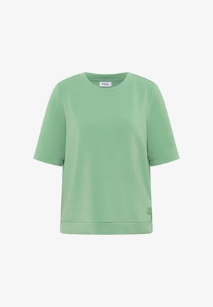 T-shirt verde chiaro a maniche corte con scollo rotondo, orlo dritto e piccolo etichetta del logo sul lato sinistro in basso.