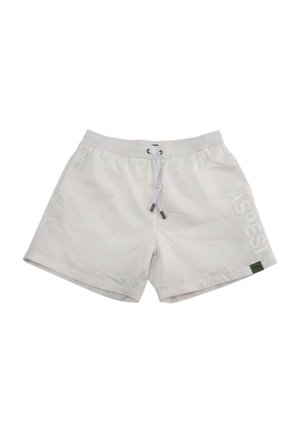 Pantaloncini casual bianchi con vita elastica e coulisse, con testo laterale e una piccola etichetta vicino all'orlo sulla gamba destra.