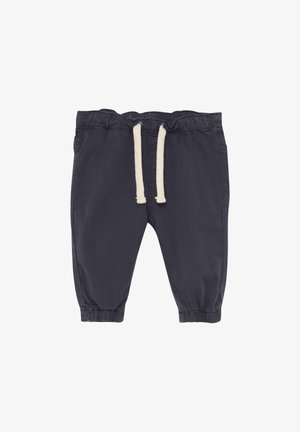 Pantalones jogger de algodón azul marino con cinturilla elástica y cordones, puños elásticos y bolsillos laterales. Textura suave con un diseño estructurado.