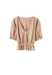 Top a maniche corte in beige chiaro, con scollatura a V profonda, tessuto strutturato e vita arricciata con orlo ondulato.