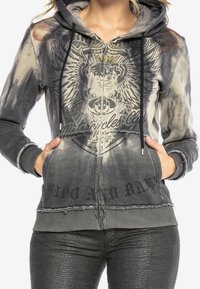 Grijze zip-up hoodie met een verweerde afwerking, grafisch ontwerp van een adelaar en tekst, met voorkanten zakken en een capuchon met trekkoord.