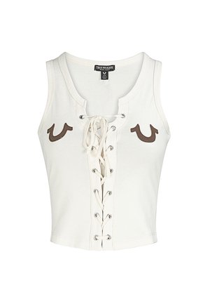 Wit mouwloos cropped topje met vetersluiting aan de voorkant en bruine, geborduurde hoefijzervormige patronen bij de borst, gelabeld True Religion maat S/P.