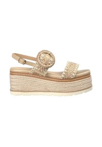 Sandal con zeppa beige con dettagli in juta intrecciata, decorazione rotonda sulla cinghia e fibbia regolabile alla caviglia. Suola in gomma piatta.