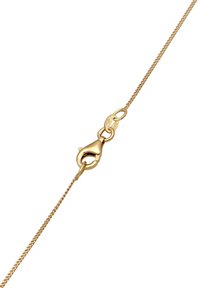 Goldene Metallkette mit feiner, glatter Textur und einem Karabinerverschluss. Das Design ist schlicht und bietet ein elegantes, geschmackvolles Erscheinungsbild.