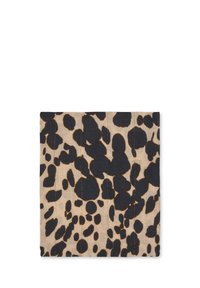 Tessuto con stampa leopardata su sfondo beige e grandi macchie nere, caratterizzato da una consistenza morbida e linee di cucitura visibili.