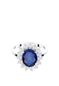 Silver ring with a large oval blue sapphire surrounded by a halo of small round clear diamonds on a white background.