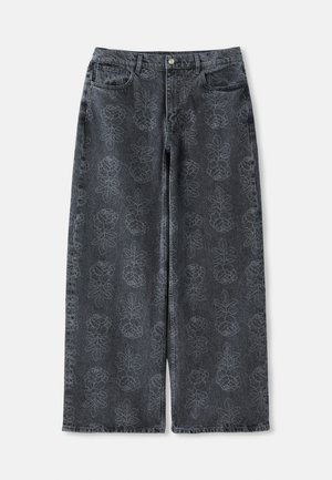 Weite Jeans aus dunkelgrauem Denim mit einem dezenten Blumenmuster. Verfügt über einen klassischen Bund und Fronttaschen. Sichtbare strukturierte Stoffdetails.