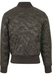Veste bomber camouflage en vert foncé et noir, avec col et poignets côtelés, texture lisse et taille élastique. Vue de dos.