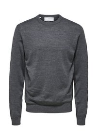 Grå crewneck sweatshirt tillverkad av mjukt tyg, med långa ärmar och en klassisk passform. Ribbad mudd vid ärmarna och nederkant för ökad textur.