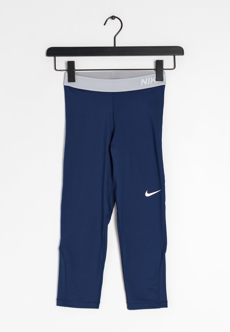 Marinblå träningsleggings med grå midja, med en vit Nike swoosh-logotyp på vänster lår. Tillverkade av ett stretchigt material.