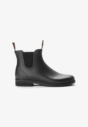 Black rubber ankle boot with elastic side panels, textured surface, flat sole, and pull tab for easy wear. Simple, sleek design.