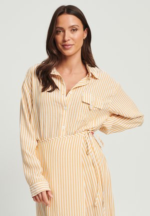 CAROLINE  - Pogājama blūze - orange stripe